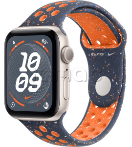 Купить Apple Watch SE // 44мм GPS // Корпус из алюминия цвета «сияющая звезда», спортивный ремешок Nike цвета «Синее пламя» (2024)