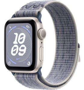 Apple Watch SE // 44мм GPS // Корпус из алюминия цвета «сияющая звезда», спортивный браслет Nike цвета «Серый/синий» (2024)