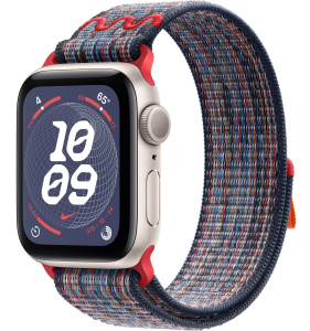 Apple Watch SE // 44мм GPS // Корпус из алюминия цвета «сияющая звезда», спортивный браслет Nike цвета «Синий/красный» (2024)