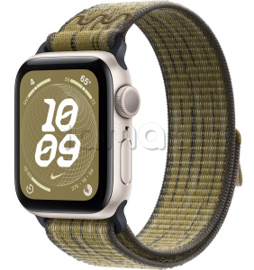 Купить Apple Watch SE // 44мм GPS // Корпус из алюминия цвета «сияющая звезда», спортивный браслет Nike цвета «Зеленый/серый» (2024)