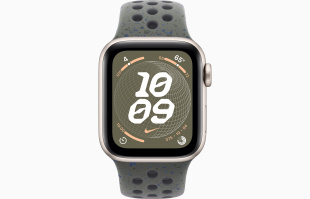 Apple Watch SE // 44мм GPS+Cellular // Корпус из алюминия цвета «сияющая звезда», спортивный ремешок Nike цвета «Карго хаки» (2024)