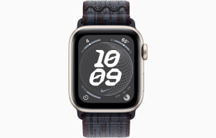 Apple Watch SE // 44мм GPS+Cellular // Корпус из алюминия цвета «сияющая звезда», спортивный браслет Nike цвета «Черный/синий» (2024)