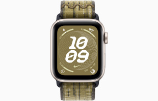 Apple Watch SE // 40мм GPS+Cellular // Корпус из алюминия цвета «сияющая звезда», спортивный браслет Nike цвета «Зеленый/серый» (2024)