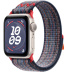 Apple Watch SE // 44мм GPS // Корпус из алюминия цвета «сияющая звезда», спортивный браслет Nike цвета «Синий/красный» (2024)