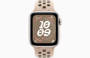 Apple Watch SE // 44мм GPS+Cellular // Корпус из алюминия цвета «сияющая звезда», спортивный ремешок Nike цвета «Пустынный камень» (2024)